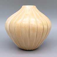 Tan melon jar with 24 carved ribs, click or tap to see a larger version