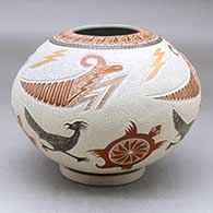A polychrome jar decorated with a lightly carved, sgraffito and painted turtle, roadrunner, grasshopper, lightning bolt and geometric design
 by Eleuterio Pina of Mata Ortiz and Casas Grandes