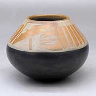 A black and sienna jar decorated with a feather and geometric design above the shoulder
 by Popovi Da of San Ildefonso