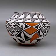 A polychrome jar decorated with a four panel fine line and geometric design below the shoulder and a geometric design above, click or tap to see a larger version
