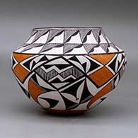 A polychrome jar decorated with a four panel fine line and geometric design below the shoulder and a geometric design above, click or tap to see a larger version
