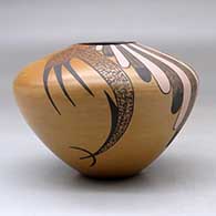 A high shouldered polychrome jar decorated with a bird element, feather and geometric design, click or tap to see a larger version