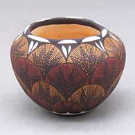 A small polychrome bowl decorated with a fineline and geometric design
 by Diane Lewis of Acoma