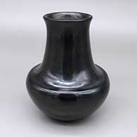 Polished black jar with a flared opening
 by Greg Garcia of Santa Clara