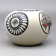 A polychrome jar decorated with a four-panel ring-of-feathers, rain cloud and geometric design, click or tap to see a larger version