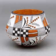 A polychrome jar decorated with a four panel corn flower, checkerboard, fineline and geometric design
 by Anne Lewis of Acoma