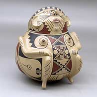 A Ramos polychrome shaman effigy pot decorated with a geometric design
 by Sabino Villalba of Mata Ortiz and Casas Grandes