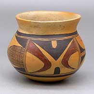 A polychrome jar with a flared rim and decorated with a four-panel cross-hatch, bird element and geometric design
 by Priscilla Namingha of Hopi