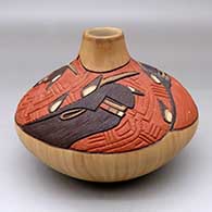 Click for a larger view A polychrome jar decorated with a carved, sgraffito and painted rendition of the Long Hair Kachinas, feathers and geometric design
 by Elvira Nampeyo of Hopi