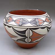 A large polychrome jar decorated inside and out with geometric design
 by Ambrose Atencio of Santo Domingo