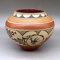 A polychrome jar decorated with a roadrunner, rain cloud and geometric design
 by Sofia Medina of Zia