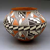 A polychrome jar decorated with a five-panel geometric design
 by Lucy Juanico of Acoma
