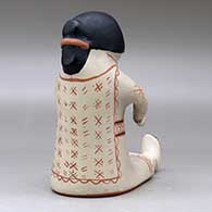 A polychrome sitting Singing Mother figure, click or tap to see a larger version