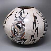 A polychrome jar decorated with a four-panel lizard, corn plant and geometric design
 by Sylvia Naha of Hopi