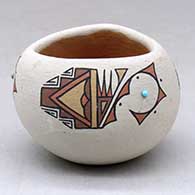 A small polychrome bowl with a triangular opening and three panel rainbird, feather and geometric design, plus three inlaid stones
 by Lois Gutierrez of Santa Clara
