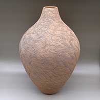 A tall, large brown lazy coil jar
 by Richard Zane Smith of Wyandot