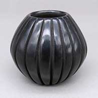 Small black melon jar with twenty ribs
 by Anita Suazo of Santa Clara