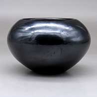 A plain, polished black bowl with fire clouds, click or tap to see a larger version