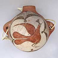 A polychrome canteen with nub handles, decorated on the front with a roadrunner and geometric design
 by Unknown of Zia