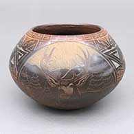 Black jar with sienna rim and sgraffito deer, avanyu, rabbit, pueblo, and geometric design
 by Kevin Naranjo of Santa Clara