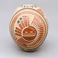 Polychrome seed pot with a sgraffito and painted sun face, feather ring, and geometric design
 by Glendora Fragua of Jemez