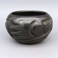 Black bowl with carved geometric design
 by Helen Shupla of Santa Clara