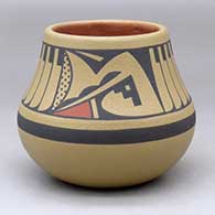 A polychrome jar decorated with a feather and geometric design above the shoulder
 by Cavan Gonzales of San Ildefonso