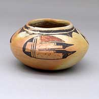 A polychrome bowl decorated around and above the shoulder with a three-panel bird element and geometric design
 by Unknown of Hopi