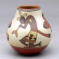 A small polychrome jar decorated with a kokopelli, flower and honeybee design
 by Lois Gutierrez of Santa Clara