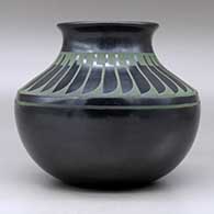 A green on black jar with a recurved neck and decorated above the shoulder with a ring of feathers design, click or tap to see a larger version