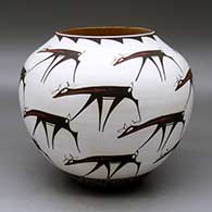 A polychrome jar decorated with a deer-with-heart-line and geometric design
 by Anderson Peynetsa of Zuni