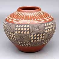 A polychrome jar decorated with a sgraffito and painted geometric design
 by Alvina Yepa of Jemez