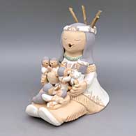 Polychrome storyteller with six children, turtle, puppy, and sticks
 by Stella Teller of Isleta