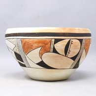 Polychrome bowl polished on the inside with a 4-panel bird element and geometric design on the outside, click or tap to see a larger version