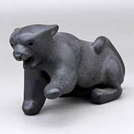 A black mountain lion figure
 by Fidel Naranjo Jr of Santa Clara