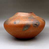 A large orange micaceous jar with an organic opening and fire clouds, click or tap to see a larger version