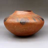 A large orange micaceous jar with an organic opening and fire clouds, click or tap to see a larger version