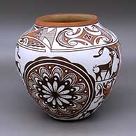 A polychrome jar decorated with a rosette, deer-with-heart-line, rainbird and geometric design
 by Noreen Simplicio of Zuni