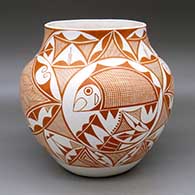 A red on white jar decorated with a four-panel fish, snowflake fineline and geometric design
 by Adrian Vallo of Acoma