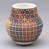 Click for a larger view A small polychrome jar decorated with a geometric design built of tiny squares
by Frederica Antonio of Acoma