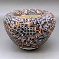 A polychrome jar with an Infinity rim and decorated with a geometric design built of tiny squares
 by Frederica Antonio of Acoma