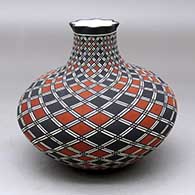A polychrome jar with a short neck and and pie crust rim, decorated around the whole with a spiraling checkerboard and geometric design
 by Paula Estevan of Acoma