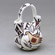 A small polychrome wedding vase decorated with a parrot, butterfly and geometric design
 by Judy Lewis of Acoma
