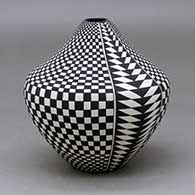 Click for a larger view A black on white tear drop jar decorated with a four-panel checkerboard and geometric design
by Cletus Victorino of Acoma