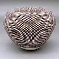 A polychrome jar with an Infinity rim and decorated with a geometric design built of tiny squares
 by Frederica Antonio of Acoma