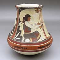 A miniature polychrome seed pot decorated with butterfly wing appliques and a butterfly, fineline and geometric design
 by Alisha Sanchez of Acoma