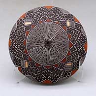 A polychrome seed pot decorated above the shoulder with a fineline and geometric design
 by Amanda Lucario of Acoma