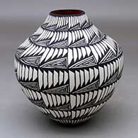 A black on white jar decorated with a geometric design
 by Sandra Victorino of Acoma