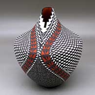 A large polychrome tear drop jar with a kiva step cut opening and decorated with a checkerboard and geometric design
 by Sandra Victorino of Acoma