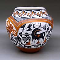 A large polychrome jar decorated with a four panel double rainbow, deer-with-heart-line, parrot, fineline and geometric design
 by Adrian Trujillo of Acoma